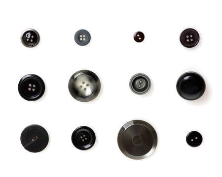 Collection of 12 gray and black buttons isolated on white backgroundの写真素材