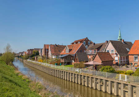 Village of Steinkirchen on LÃ¼he river in Altes Land region of Lower Saxony, Germanyの写真素材