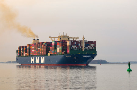 Stade, Germany - March 31, 2021: HMM ALGECIRAS, with her sister ships the largest container ship worldwide operated by Hyundai Merchant marine on Elbe river near Hamburg.のeditorial素材