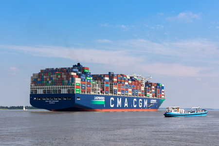 Stade, Germany - June 25, 2021: Rear view of one of the nine largest Liquefied Natural Gas powered ships of the world, container vessel CMA CGM CONCORDE on Elbe river.のeditorial素材