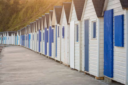 Row of blue and white beach huts at Barneville-Carteret, Cotentin peninsula, Normandy, Franceの写真素材