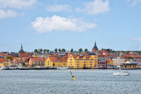 Old town and waterfront with historic sail boat harbor of Svendborg, Funen, Denmarkの写真素材