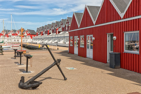 Wooden red and white buildings at the harbor of Bagenkop, Langeland, Denmarkの写真素材