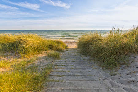 Entrance to the beach of Ristinge, Baltic Sea island of Langeland, Denmarkの写真素材