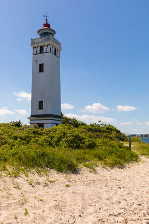 Strib Fyr, lighthouse on the beach of Middelfart, Funen, Denmarkの写真素材