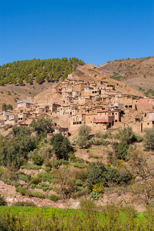 Berber village on a hillside in the Atlas mountains, Moroccoの写真素材