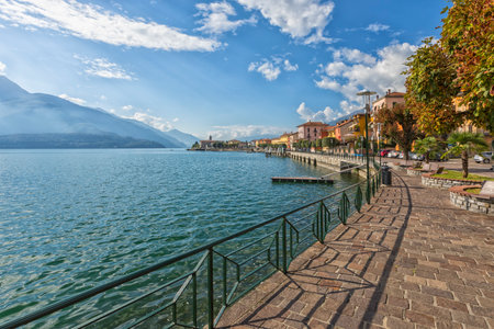Boardwalk of Gravedona ed Uniti and Lake Como on a sunny late summer dayの写真素材