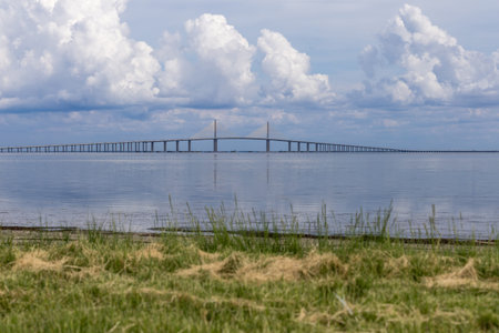 Suspension bridge over the Historic Sunshine Skyway Bridge Pinellas County Florida viewed at ground level at Ft. Desoto Beachの写真素材