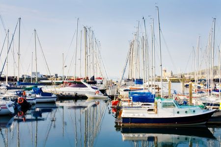 Row of boats and yachts docked at Howth harbor, Dublinの写真素材