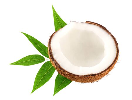 half of coconut with green leaves isolated on white backgroundの写真素材