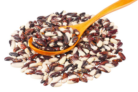 kidney beans in wooden spoon isolated on white background
