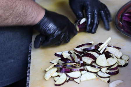 Chef Chopping Green Peppers in Restaurant (3)の写真素材