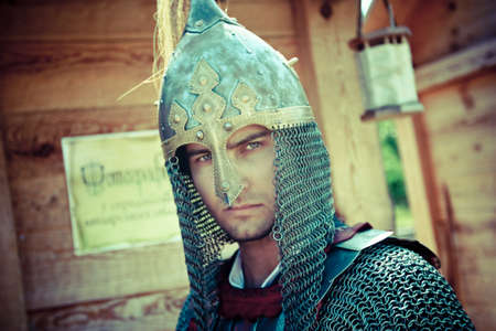 portrait of a man dressed as a medieval knight in full armor の写真素材