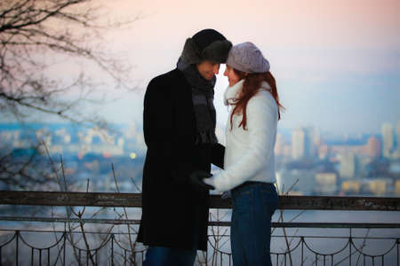 Couple in Love holding hands in winterの写真素材