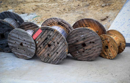 wooden coils for cable in the construction yardの写真素材