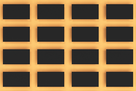 Black blank business cards mock-up on orange background. Corporate stationery template. 3D rendering illustrationの写真素材