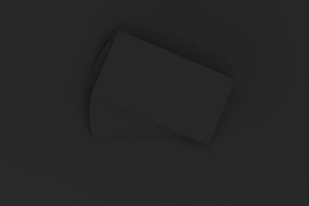 Black blank business cards mock-up on black background. Corporate stationery template. 3D rendering illustrationの写真素材