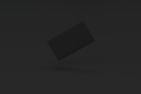 Black blank business cards mock-up on black background. Corporate stationery template. 3D rendering illustrationの写真素材