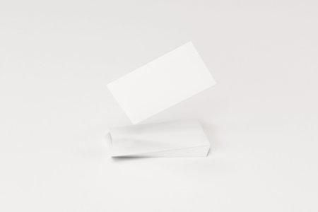 White blank business cards mock-up on white background. Corporate stationery template. 3D rendering illustrationの写真素材