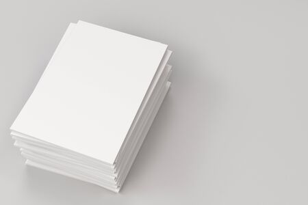 Stack of blank white closed brochure mock-up on white background. Magazine cover template. 3D rendering illustrationの写真素材