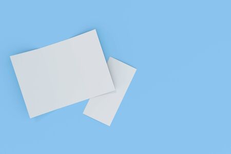 Blank white open three fold brochure mockup on blue background. Open and closed leaflet or booklet template. 3D rendering illustrationの写真素材