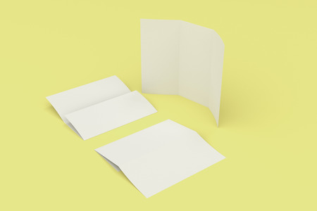 Blank white three fold brochure mockup on yellow background. Leaflet or booklet template. 3D rendering illustrationの写真素材