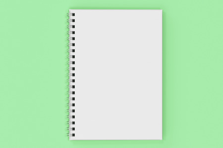 Opend blank notebook with white cover and metal spiral bound on green background. Business or education mockup. 3D rendering illustrationの写真素材