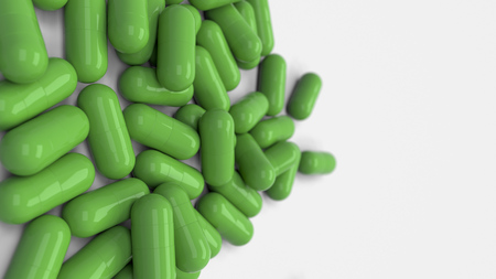 Pile of green medicine capsules on white background. Medical, healthcare or pharmacy concept. 3D rendering illustrationの写真素材