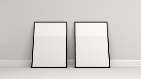 Blank white poster in black frame standing on the floor near the wall. Picture or photo mockup. 3D render illustrationの写真素材