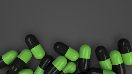 Pile of black and green medicine capsules on black background. Medical, healthcare or pharmacy concept. 3D rendering illustrationの写真素材