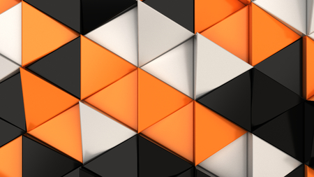 Pattern of black, white and orange triangle prisms. Wall of prisms.の写真素材