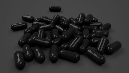 Pile of black medicine capsules on black background. Medical, healthcare or pharmacy concept. 3D...