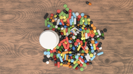 Realistic blank white plastic bottle and pile of pills on wooden background. Medical container. Drug bottle mockup. 3D render illustrationの写真素材