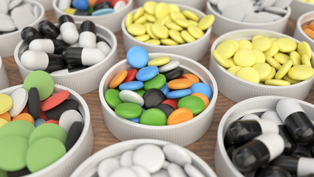 Different colorful drug pills in white lids from medicine bottles on wooden background. Medical pattern. 3D render illustrationの写真素材