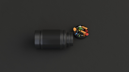 Realistic blank black open plastic bottle with pills lying on the black surface. Medical container. Drug bottle mockup. 3D render illustrationの写真素材