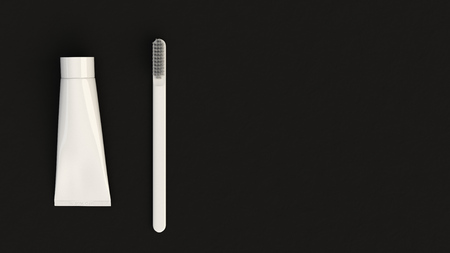 Blank white tube of toothpaste and toothbrush on black background. Branding or medical mockup. 3D rendering illustrationの写真素材