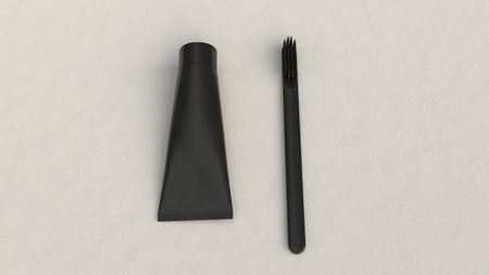 Blank black tube of toothpaste and toothbrush on white background. Branding or medical mockup. 3D rendering illustrationの写真素材