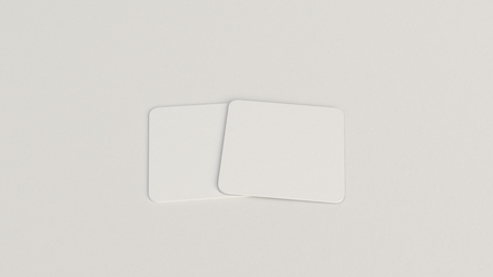 Mockup of blank white square beer coasters on white background. Branding template. 3D rendering illustrationの写真素材