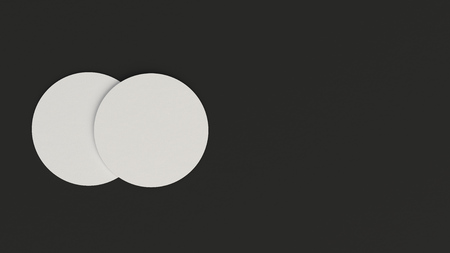 Mockup of blank white round beer coasters on black background. Branding template. 3D rendering illustrationの写真素材