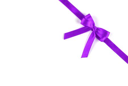 Shiny purple silk ribbon isolated on white background. Festive concept. Flat lay.の写真素材