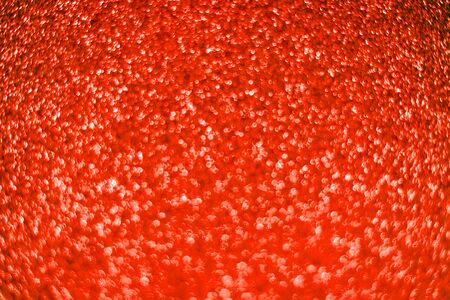 Bright sparkle red background. Holiday and festive concept. New year, Christmas, Wedding Day, Birthdayの写真素材