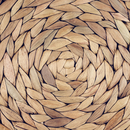 Handmade Wicker placemat made from water hyacinth. Top view, nature background.