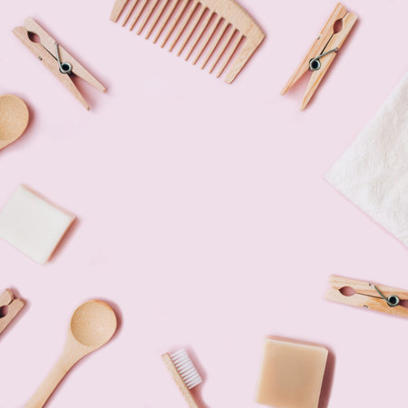 Zero waste set for bathing on light pink background. Flat lay style.