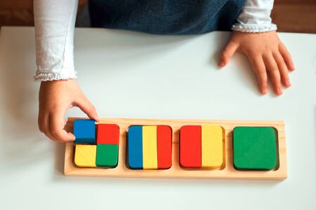 Childrens hands with mathematics materials. Close up. The studying of mathematics School and kindergarten.の写真素材