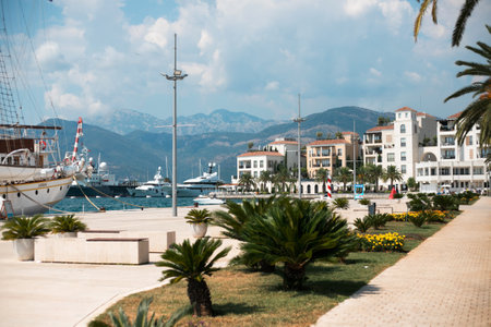 TIVAT, MONTENEGRO - SEPTEMBER 05, 2019: Wonderful view of waterfront promenade of beautiful town of Tivat, Montenegro. Warm autumn on the seaside.のeditorial素材