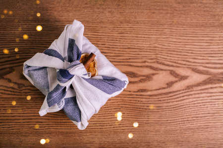 Christmas furoshiki wrapping. Zero waste Christmas concept.の写真素材