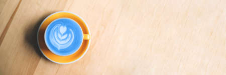 Banner with blue matcha art on wooden background.の写真素材