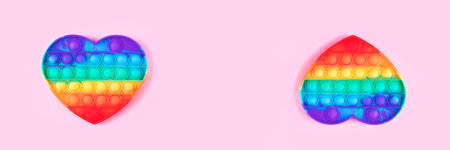 Banner from toy isolated on pink background.