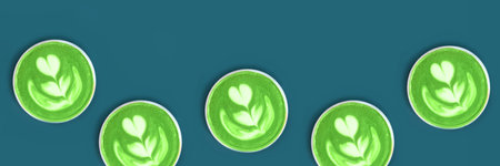 Banner with pattern with fresh flavored green matcha art is on the cafes table.の写真素材