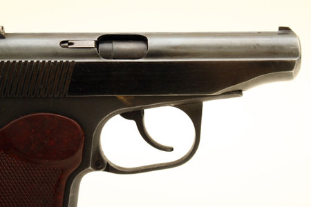 Trunk and trigger of a gun on a white background.の写真素材